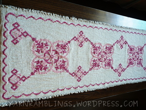 Cross-stitched coffee table runner